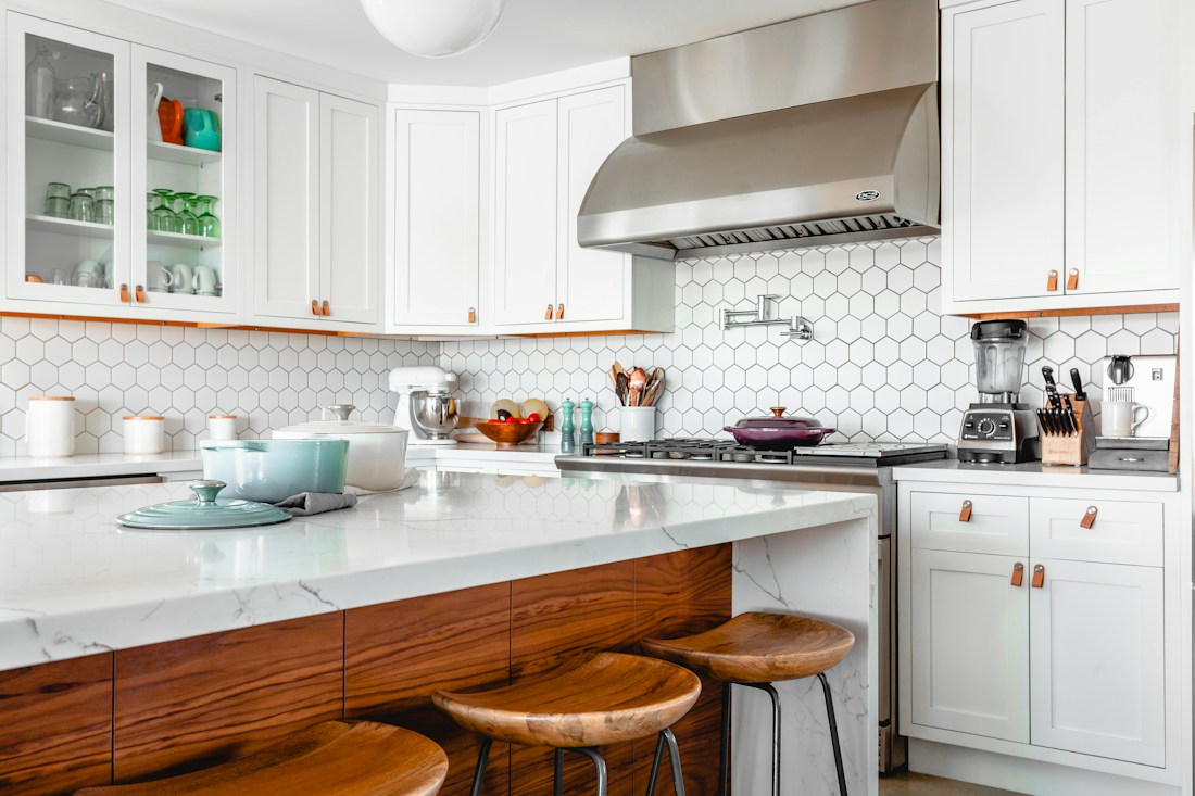 Real kitchen interior with cabinetry and countertop workspace